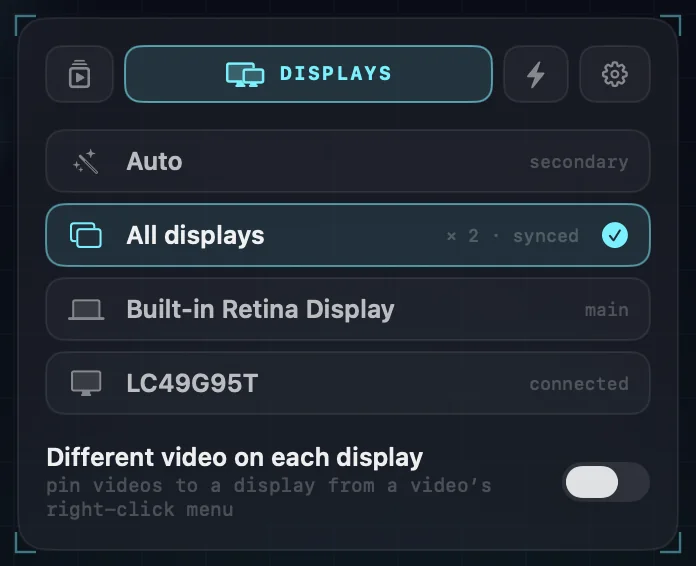 The Displays settings: Auto, All displays (selected, two displays in sync), each connected display by name, and the switch for a different video on each display.